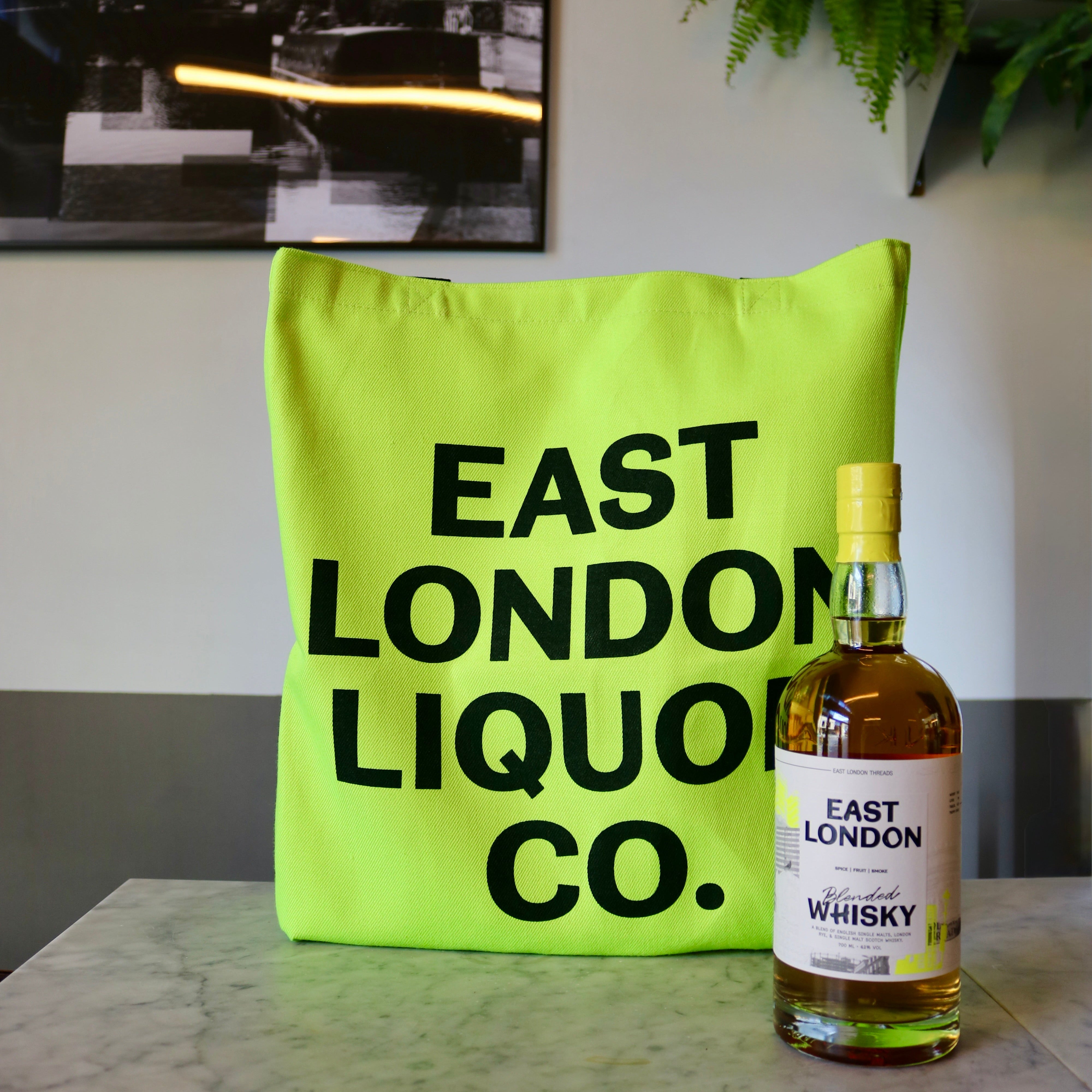 East London Blended Whisky with a neon tote bag
